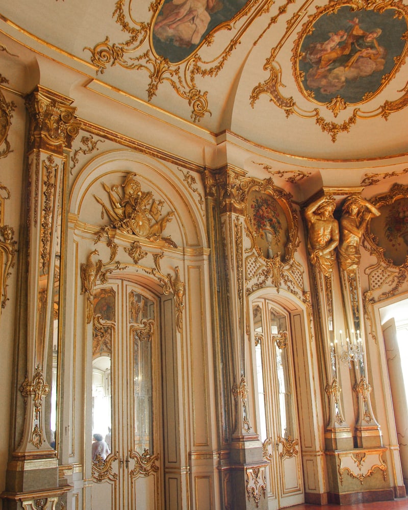 Palácio Nacional de Queluz — the pink rococo summer palace of the Portuguese Bragança royal family, set in formal French-style gardens between Lisbon and Sintra.